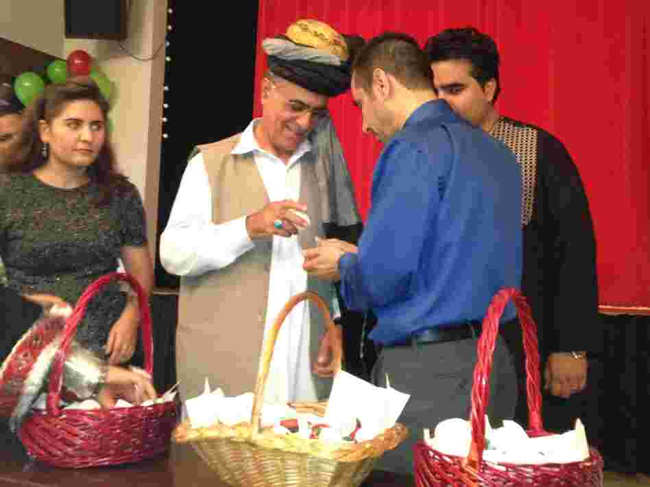Afghan instructors demonstrate how to play a game called "egg jousting" for U.S. soldiers at Fort Campbell, Ky.