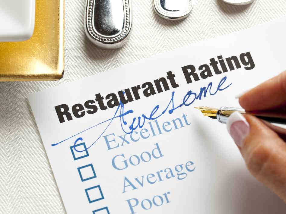 One sign that a restaurant review is a fake is if it gives a very high or very low rating without many specifics.