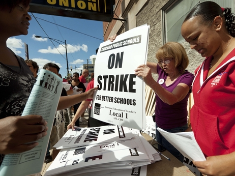 Members of the Chicago Teachers Union distribute strike signage at the Chicago Teachers Union strike headquarters on Saturday, Sept. 8, 2012 in Chicago. Members of the Chicago Teachers Union distribute strike signage at the Chicago Teachers Union strike headquarters on Saturday, Sept. 8, 2012 in Chicago.