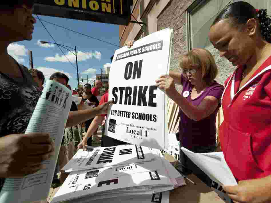 Members of the Chicago Teachers Union distribute strike signage at the Chicago Teachers Union strike headquarters on Saturday, Sept. 8, 2012 in Chicago.