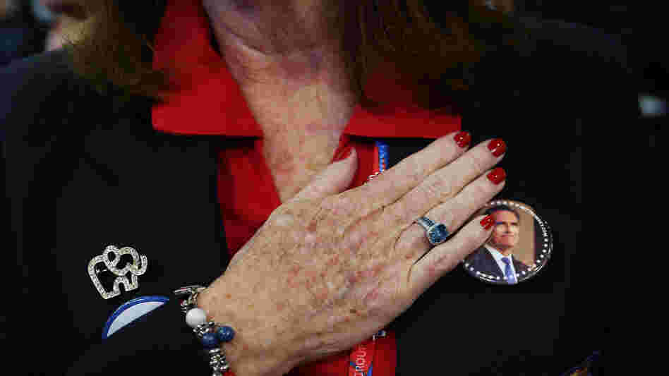 A woman recites the Pledge of Allegiance at the Republican National Convention in Tampa, Fla., on Aug. 29.