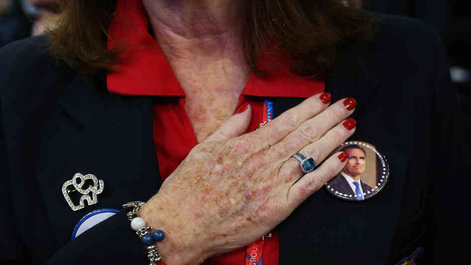 A woman recites the Pledge of Allegiance at the Republican National Convention in Tampa, Fla., on Aug. 29.