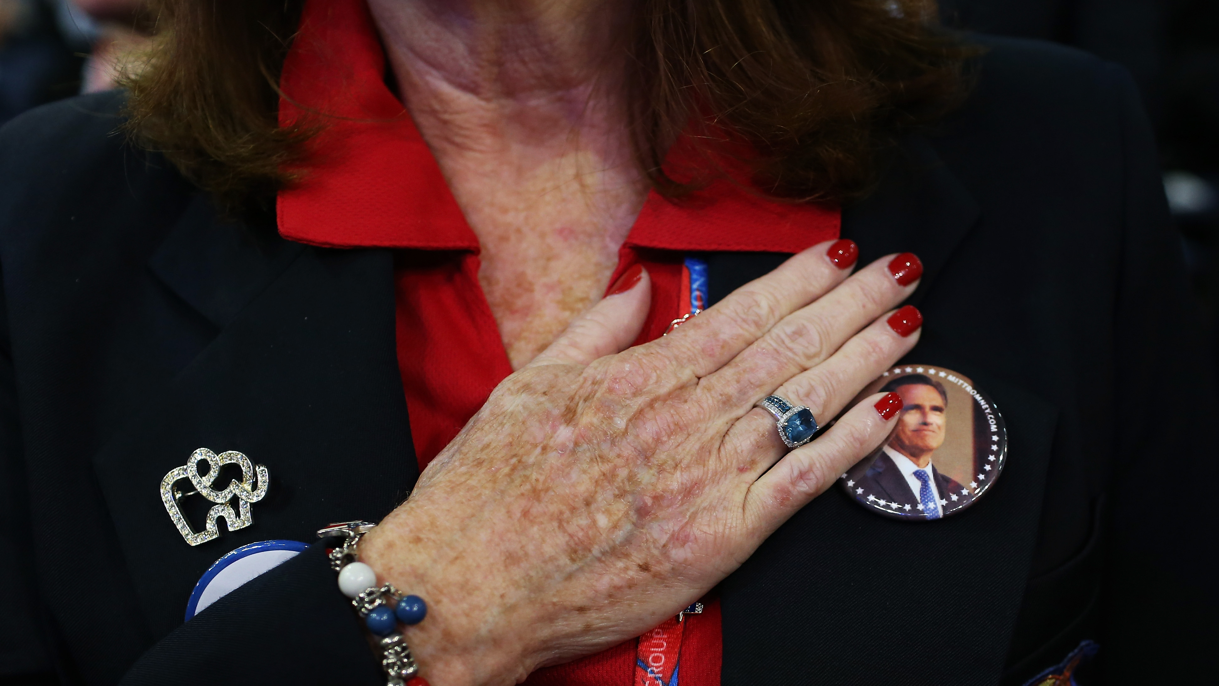 A woman recites the Pledge of Allegiance at the Republican National Convention in Tampa, Fla., on Aug. 29.