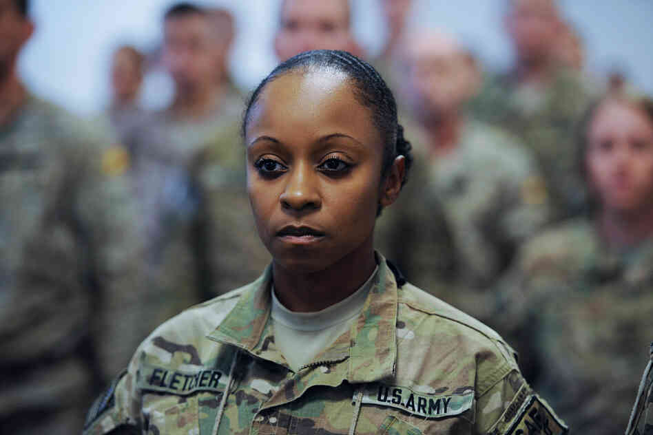 A U.S. soldier with the NATO-led International Security Assistance Force looks on during a Sept. 11 memorial ceremony Tuesday at Kaia airport in Kabul, Afghanistan.