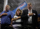 Attendees at Monday's Mitt Romney rally in Mansfield, Ohio, recite the Pledge of Allegiance. Attendees at Monday's Mitt Romney rally in Mansfield, Ohio, recite the Pledge of Allegiance.