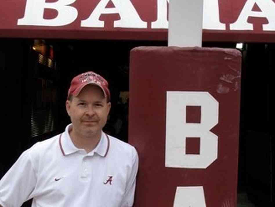 Monique Fields, an unofficial, unpaid football assistant, snapped this picture of her husband, Ken, standing at the goalpost at Bryant-Denny Stadium. Monique Fields, an unofficial, unpaid football assistant, snapped this picture of her husband, Ken, standing at the goalpost at Bryant-Denny Stadium.