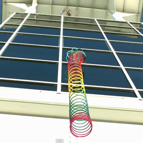 Slinky half-collapsed, midair.