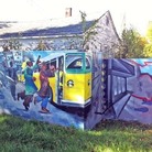 Part of the wall that was built in 1940 has since been painted over with a mural.