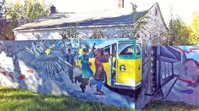 Part of the wall that was built in 1940 has since been painted over with a mural.