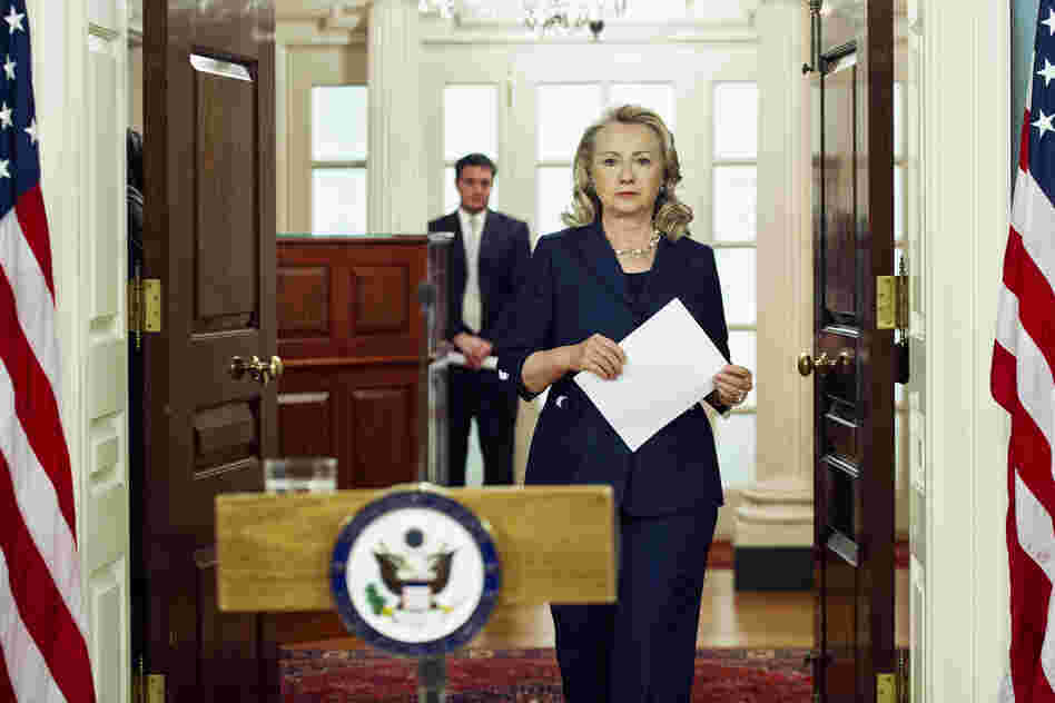 Secretary of State Hillary Clinton arrives to speak on the killing of Stevens and three staff members. "This is an attack that should shock the conscience of people of all faiths around the world," she said. "There is no justification ... violence is no way to honor faith."