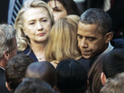 Secretary of State Hillary Clinton looks on as President Obama hugs a State Department employee Wednesday. Obama met with State Department workers after the killing of four Americans in Libya. Secretary of State Hillary Clinton looks on as President Obama hugs a State Department employee Wednesday. Obama met with State Department workers after the killing of four Americans in Libya.