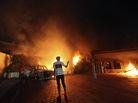 The U.S. Consulate in Benghazi was in flames during a protest by an armed group angry over a film ridiculing Islam's Prophet Muhammad. The U.S. Consulate in Benghazi was in flames during a protest by an armed group angry over a film ridiculing Islam's Prophet Muhammad.