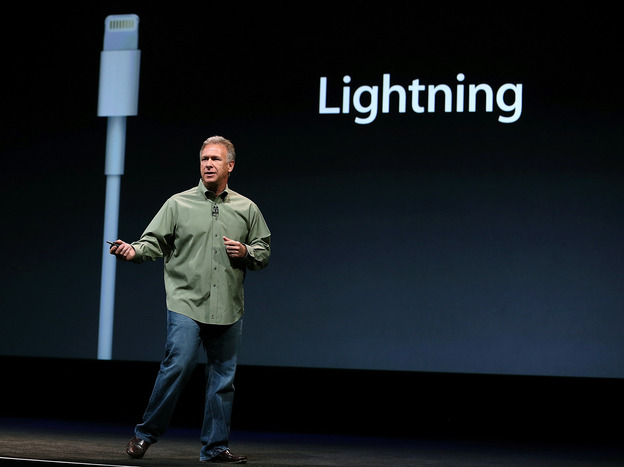 Philip Schiller of Apple announces the Lightning connector during an event to unveil the new iPhone 5 in San Francisco on Wednesday.