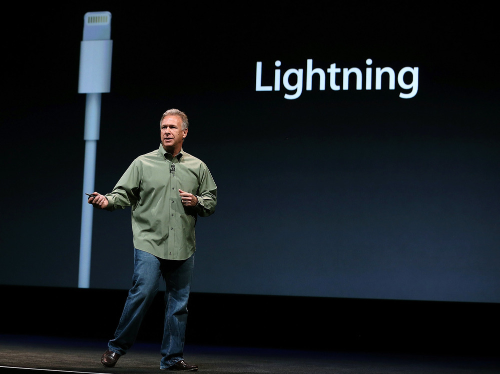 Philip Schiller of Apple announces the Lightning connector during an event to unveil the new iPhone 5 in San Francisco on Wednesday.