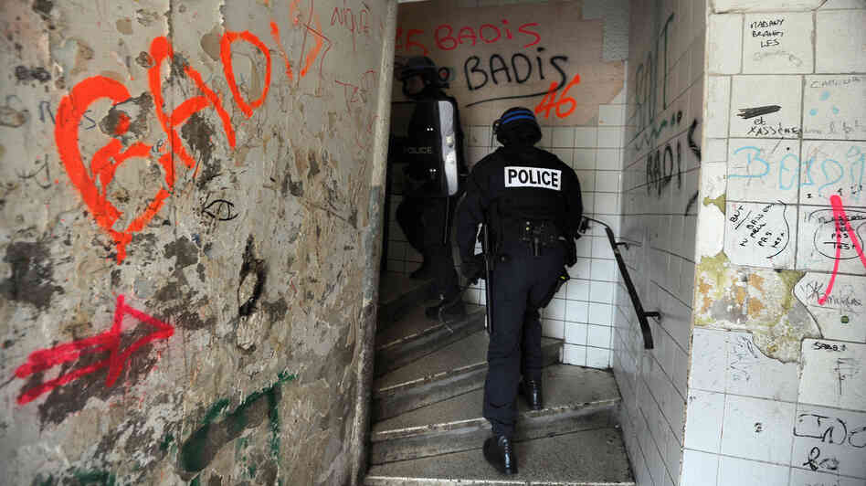 Police climb the stairs in a building on the north side of Marseille, southern France, as part of an operation in January against drug dealing and gun proliferation. Police climb the stairs in a building on the north side of Marseille, southern France, as part of an operation in January against drug dealing and gun proliferation.