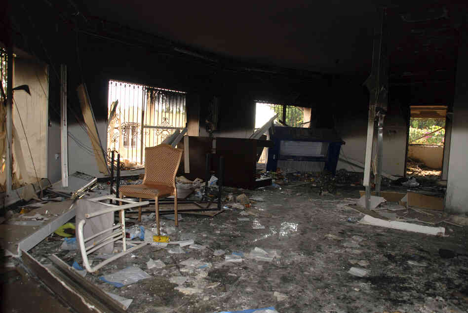 Glass, debris and overturned furniture are strewn inside a room in the gutted U.S. Consulate. Ambassador Stevens died as he and a group of embassy employees went to the consulate to try to evacuate staff as a crowd of hundreds attacked the consulate, many of them firing machine guns and rocket-propelled grenades.