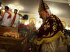 Father Mina celebrates the Christmas Nativity Liturgy, the start of Christmas, at the Coptic Orthodox Church of St. George on Jan. 6 in Brooklyn, N.Y. Coptic churches around the country have witnessed a surge of Christians fleeing Egypt since the start of the Arab Spring.