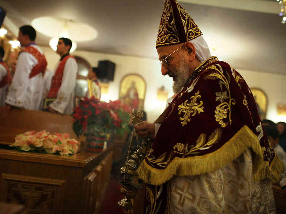 Father Mina celebrates the Christmas Nativity Liturgy, the start of Christmas, at the Coptic Orthodox Church of St. George on Jan. 6 in Brooklyn, N.Y. Coptic churches around the country have witnessed a surge of Christians fleeing Egypt since the start of the Arab Spring.