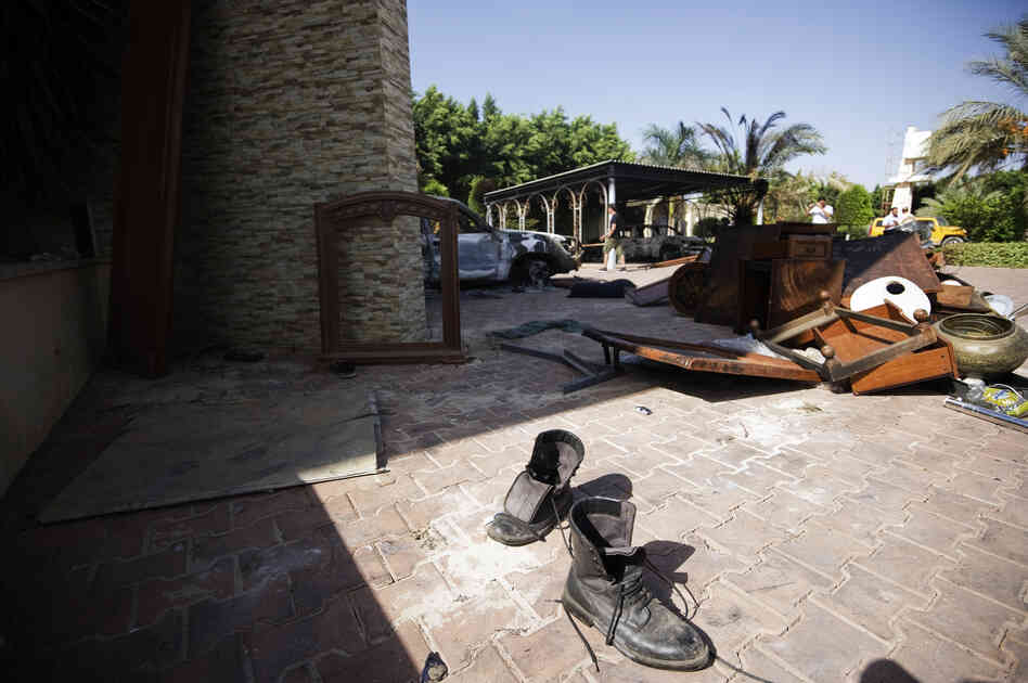 Broken furniture outside the U.S. consulate building in Benghazi on Thursday, following an attack on the building late on September 11.