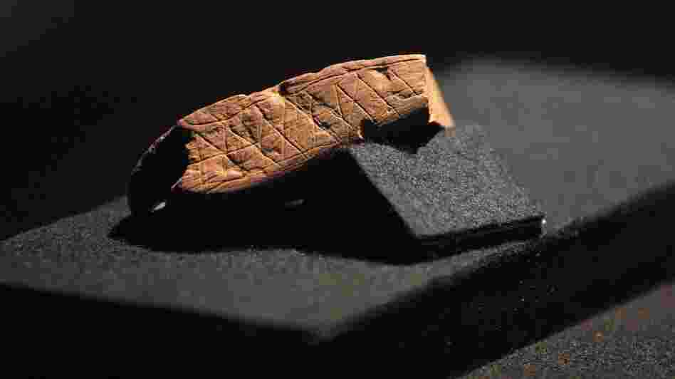 A piece of red ochre with a deliberately engraved design is pictured here at Cape Town's Iziko/South African Museum in 2002. The piece was discovered in Blombos Cave near Stilbaai, about 300 kilometers from Cape Town.