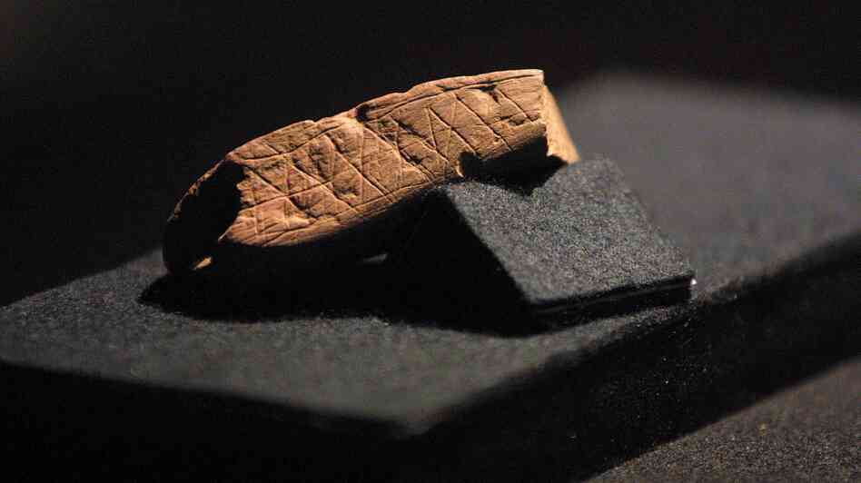 A piece of red ochre with a deliberately engraved design is pictured here at Cape Town's Iziko/South African Museum in 2002. The piece was discovered in Blombos Cave near Stilbaai, about 300 kilometers from Cape Town.