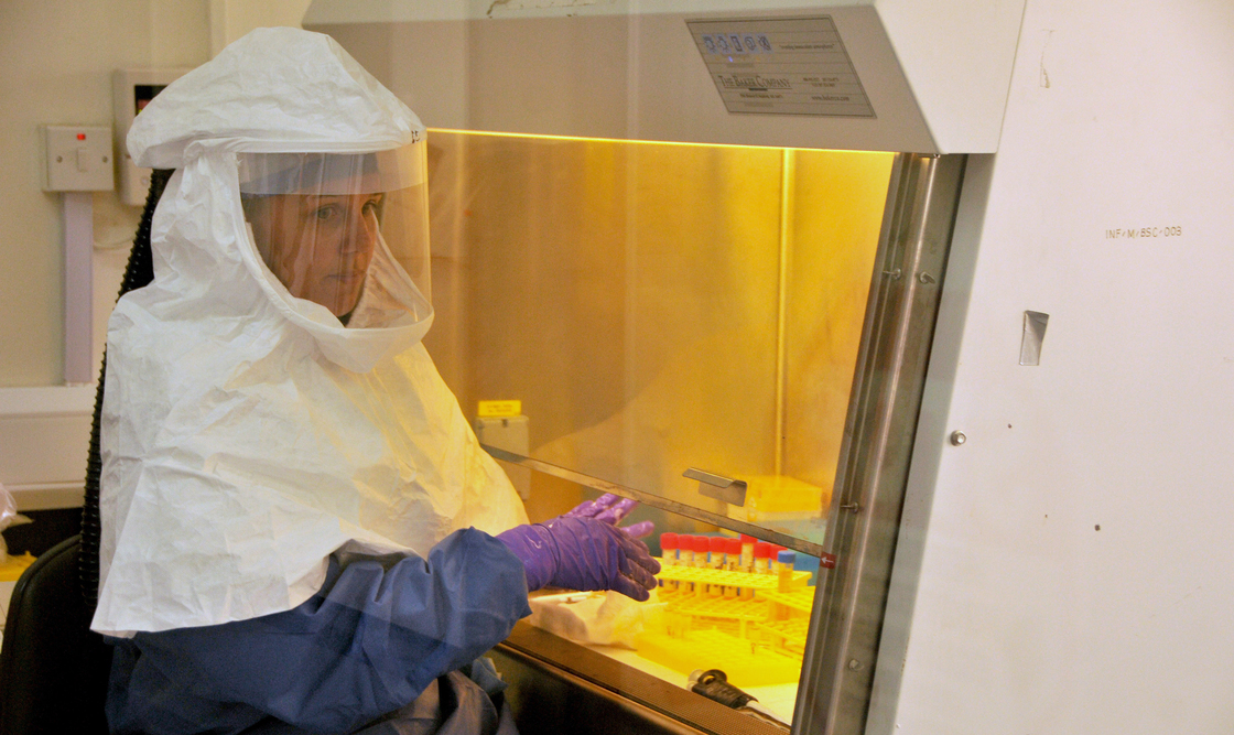 A medical worker from the U.S. Centers for Disease Control and Prevention works at the laboratory in Uganda where Ebola specimens were tested at the start of the latest outbreak in the Democratic Republic of Congo.