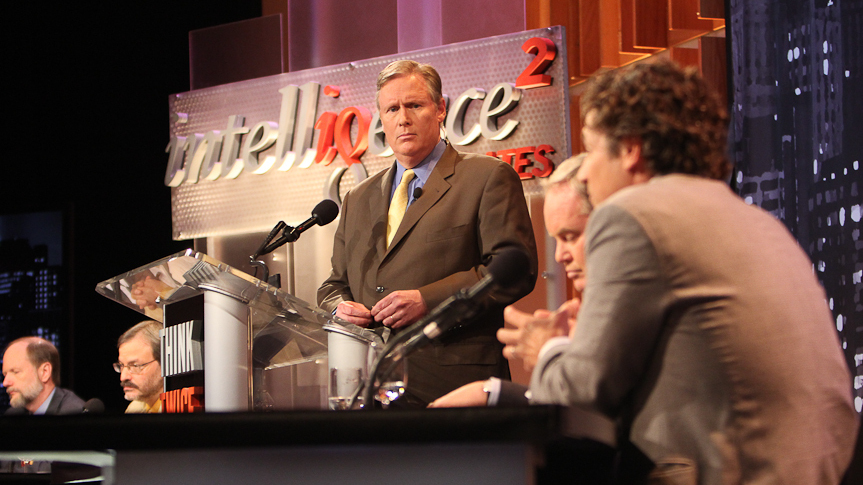 John Donvan of ABC News moderates an <em>Intelligence Squared</em> debate on the regulation of money in politics.