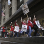 Chicago Teachers Union members picket the CPS headquarters in Chicago on Thursday, the fourth day of their strike. Chicago Teachers Union members picket the CPS headquarters in Chicago on Thursday, the fourth day of their strike.
