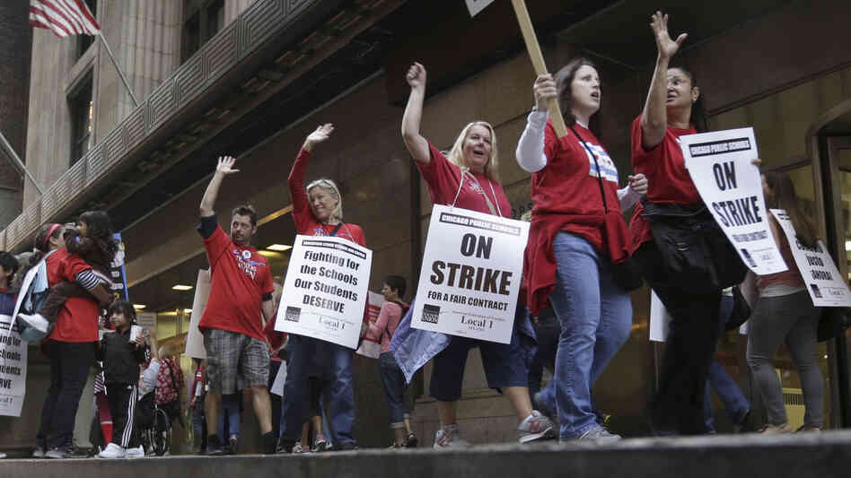 Chicago Teachers Union members picket the CPS headquarters in Chicago on Thursday, the fourth day of their strike. Chicago Teachers Union members picket the CPS headquarters in Chicago on Thursday, the fourth day of their strike.