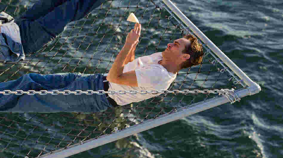 Joaquin Phoenix stars as Navy veteran Freddie Quell in The Master.