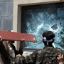 A mob in Yemen attacks the U.S. Embassy during a protest against a film they say insults the Prophet Muhammad, in the capital, Sanaa, on Thursday.