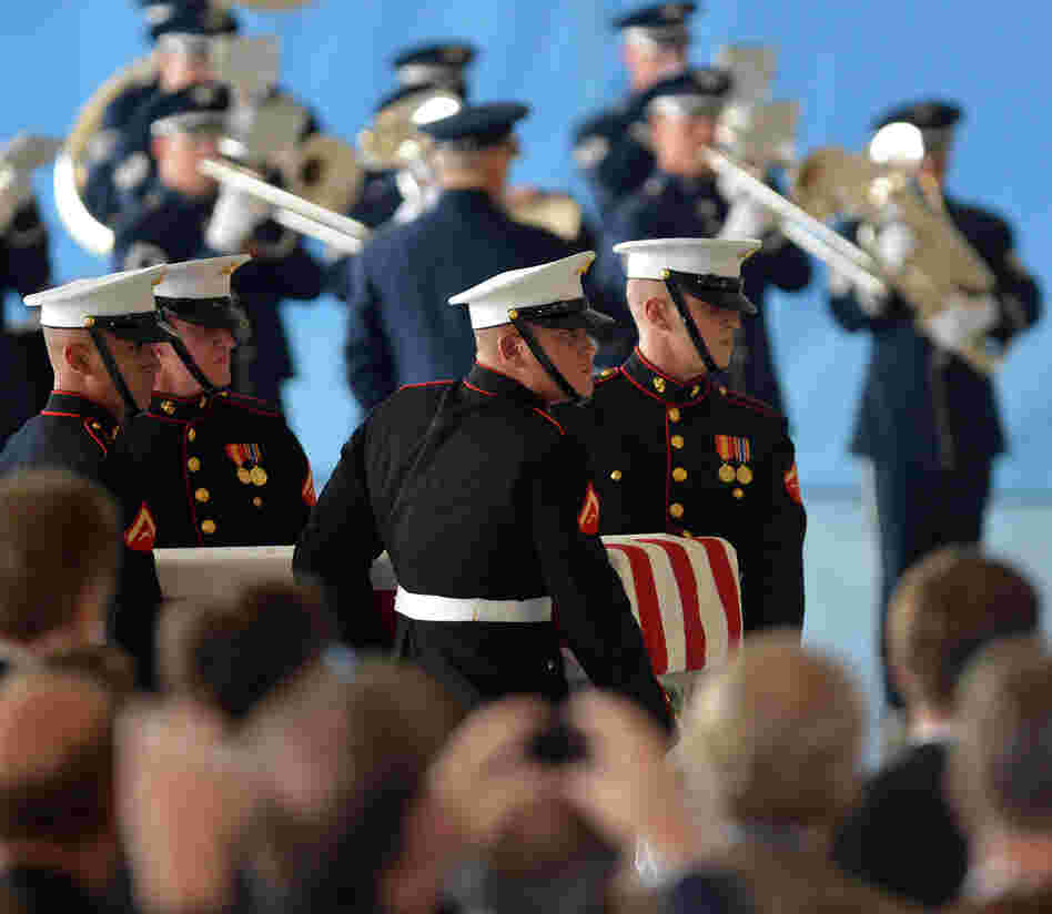 U.S. Marines carry a casket during the transfer of remains ceremony, marking the return of the remains of the four Americans killed in an attack this week in Benghazi, Libya.