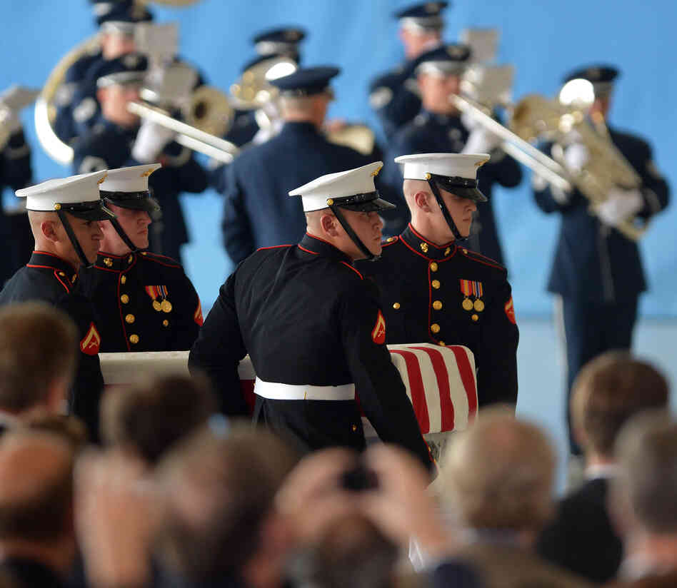U.S. Marines carry a casket during the transfer of remains ceremony, marking the return of the remains of the four Americans killed in an attack this week in Benghazi, Libya.
