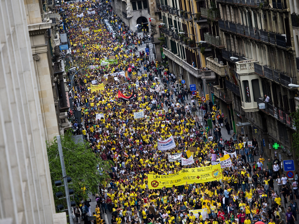 Thousands of teachers and students demonstrate during a protest against education cuts on May 22 in Barcelona, Spain. Teachers are planning another strike for later in September.