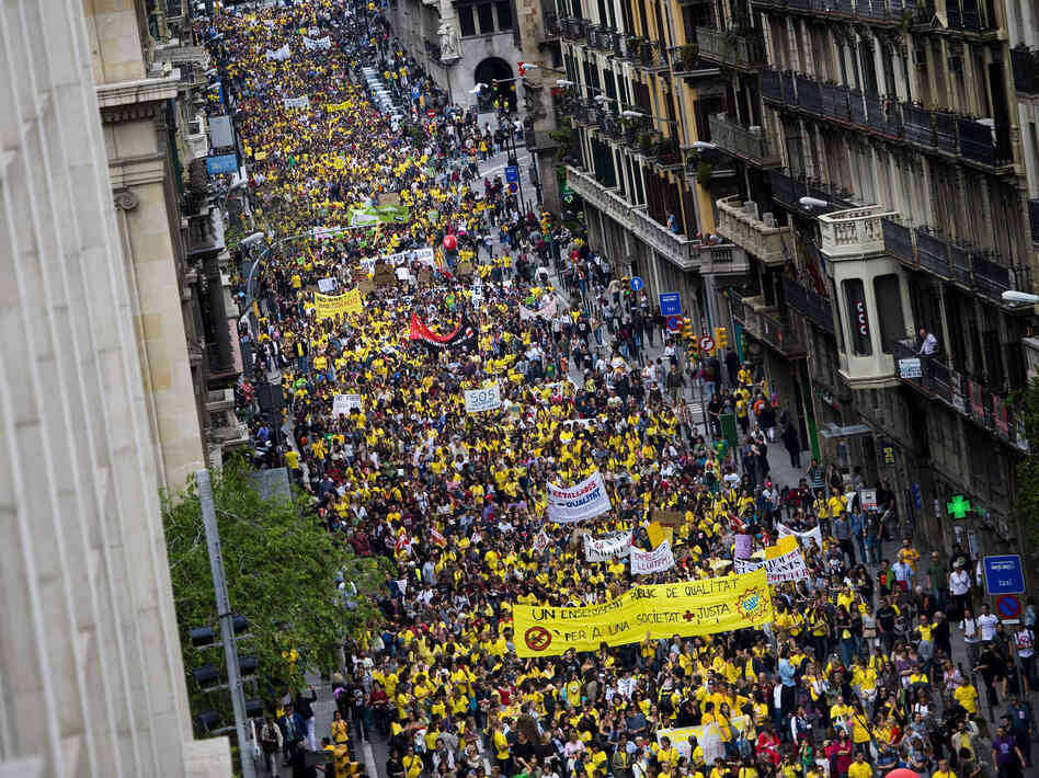 Thousands of teachers and students demonstrate during a protest against education cuts on May 22 in Barcelona, Spain. Teachers are planning another strike for later in September.