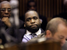 Former Detroit Mayor Kwame Kilpatrick (center) appears in county circuit court in Detroit for his sentencing in 2008. Former Detroit Mayor Kwame Kilpatrick (center) appears in county circuit court in Detroit for his sentencing in 2008.