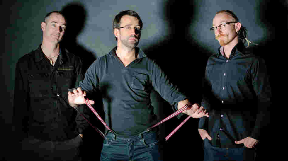 The Neil Cowley Trio is: (L-R) Evan Jenkins, Cowley, Rex Horan.