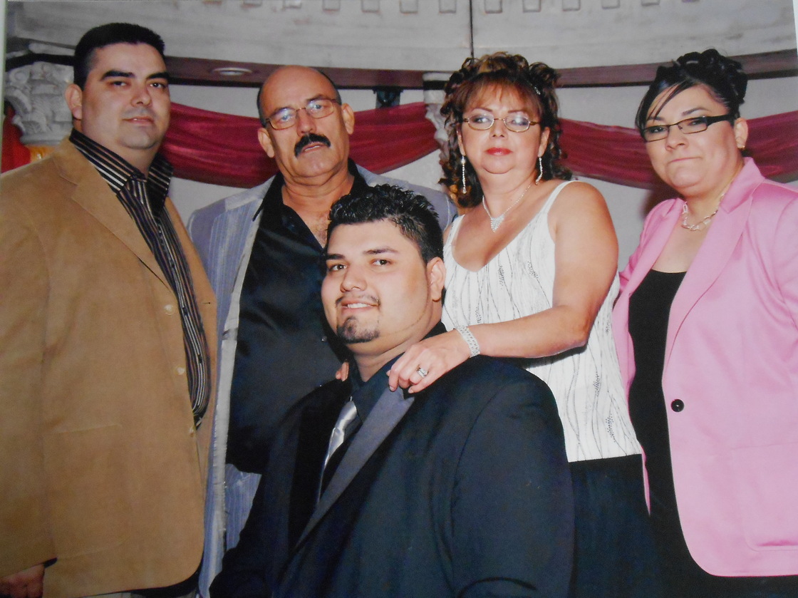 Samantha Moreno, in pink, with her family. "The hardest part of coming out is to know that you're about to hurt someone that you love," she says in a video featured on the website of Familia es Familia, which aims to help Latino families accept their LGBT loved ones.