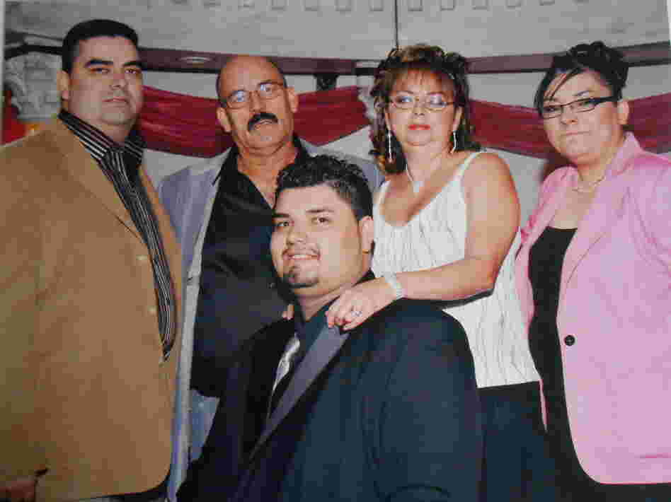 Samantha Moreno, in pink, with her family. "The hardest part of coming out is to know that you're about to hurt someone that you love," she says in a video featured on the website of Familia es Familia, which aims to help Latino families accept their LGBT loved ones.