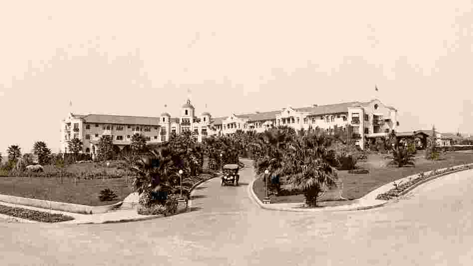 The Beverly Hills Hotel as it looked when it opened in 1912. The bleak landscape would eventually be replaced by lush tropical foliage, and after the depression, the white Spanish Mission-style hotel would be painted its now-famous pink.