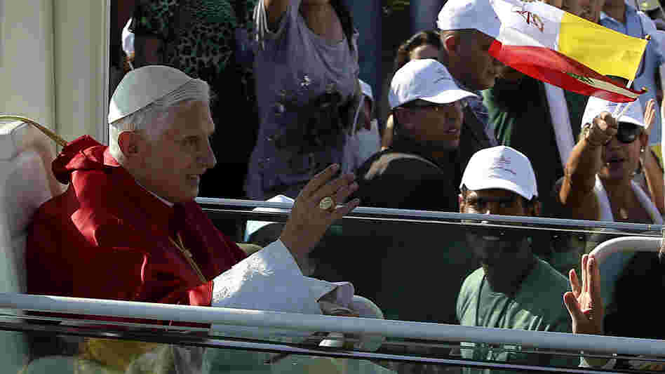 Pope Benedict XVI waves to Lebanese faithful upon his arrival to hold a mass on the waterfront in downtown Beirut on Sunday.