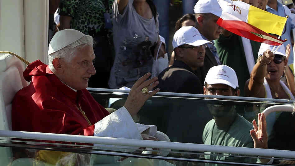 Pope Benedict XVI waves to Lebanese faithful upon his arrival to hold a mass on the waterfront in downtown Beirut on Sunday.