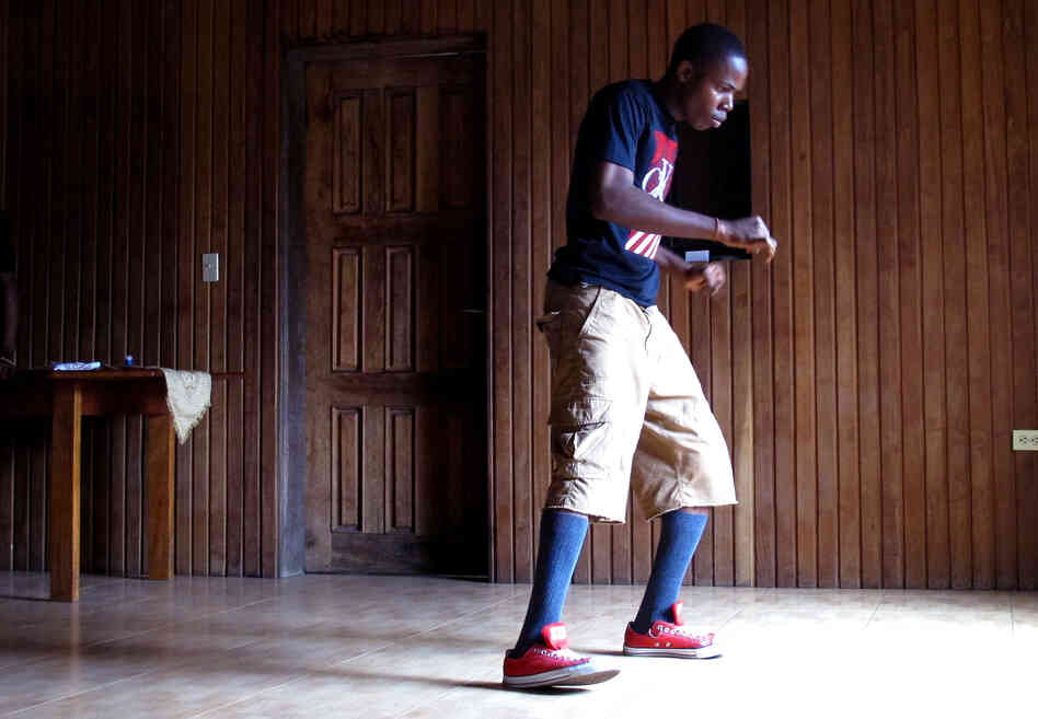 Franklyn Dunbar, 17, practices krumping with his crew at his mother's house in Paynesville, a suburb of Monrovia, Liberia. Dunbar was born in New York, but moved to his home country of Liberia seven years ago.