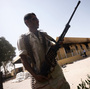 A member of the Libyan security forces secures the area around the U.S. Consulate compound in Benghazi on Sept. 14. Benghazi, and other parts of eastern Libya, are suffering from an acute lack of security, making it vulnerable to militant violence.