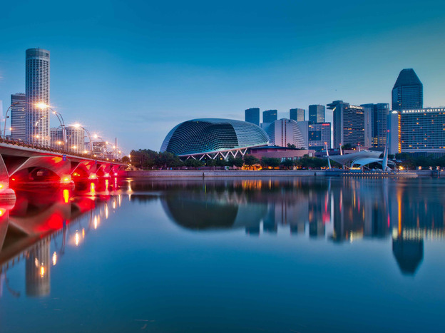 A reflection of the Marina Bay Esplanade in Singapore. The nation is increasingly seen as a corporate logistics hub and gateway to the region's emerging markets.