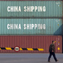 Shipping containers sit at a port in Tianjin, China, on Feb. 28.