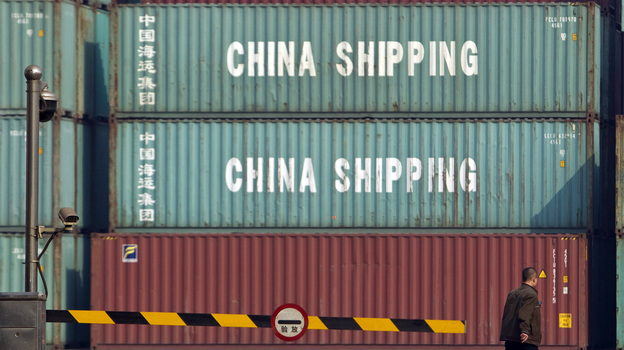 Shipping containers sit at a port in Tianjin, China, on Feb. 28.