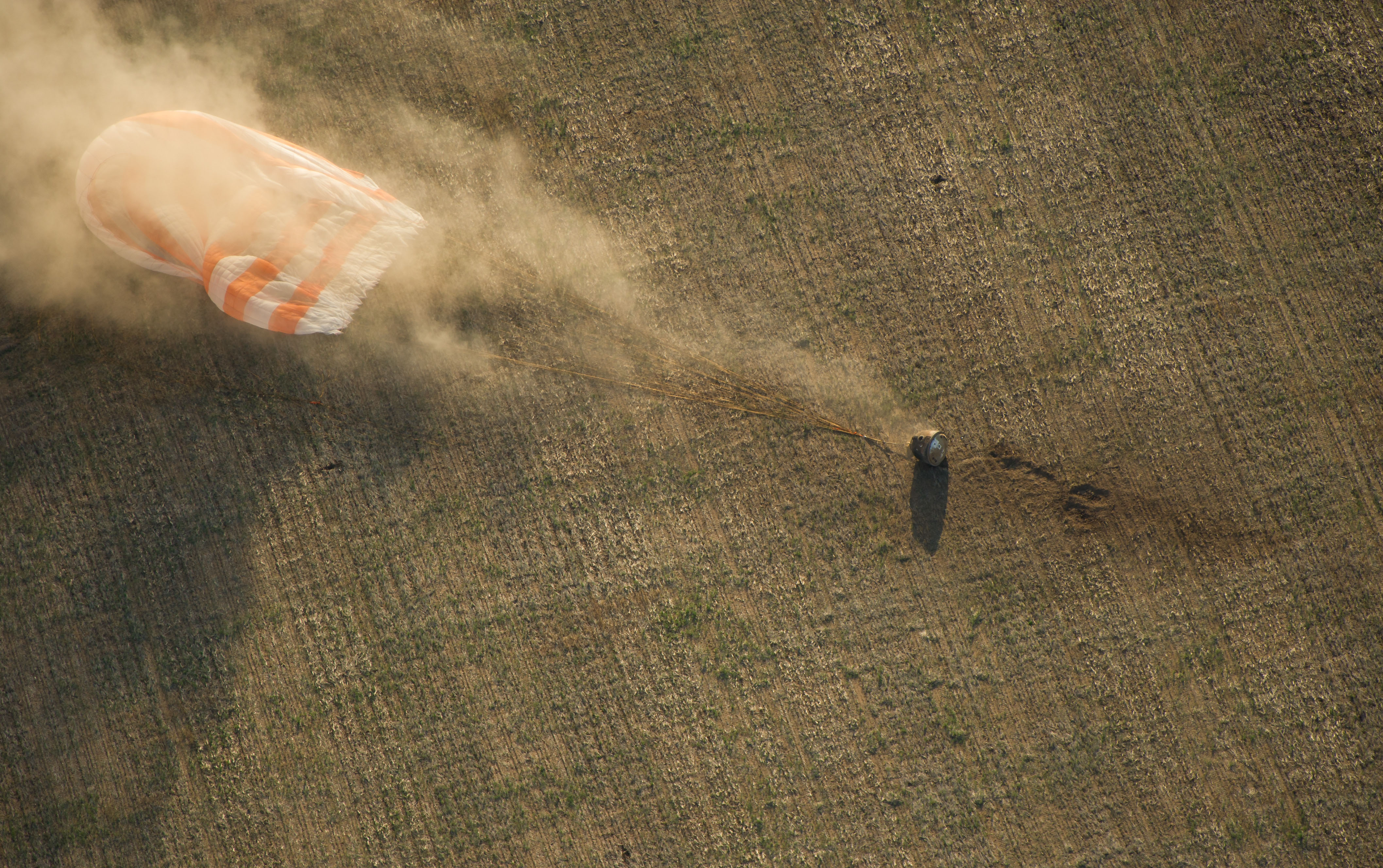 The Soyuz TMA-04M capsule lands in a remote area near the town of Arkalyk, Kazakhstan, Monday. Padalka, Acaba and Revin returned from five months onboard the International Space Station, where they served as members of the Expedition 31 and 32 crews.