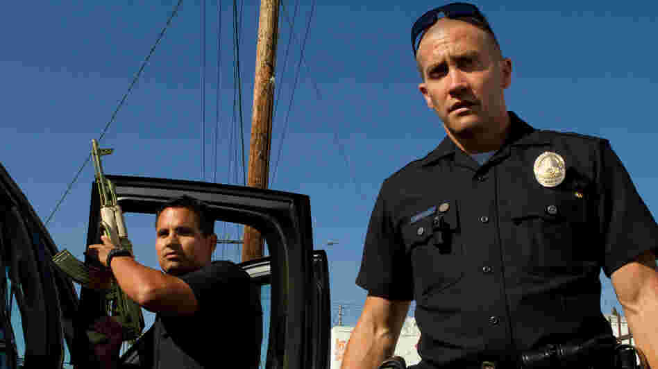 Officers Brian Taylor (Jake Gyllenhaal) and Mike Zavala (Michael Peña) become the targets of a drug cartel in End of Watch. Officers Brian Taylor (Jake Gyllenhaal) and Mike Zavala (Michael Peña) become the targets of a drug cartel in End of Watch.