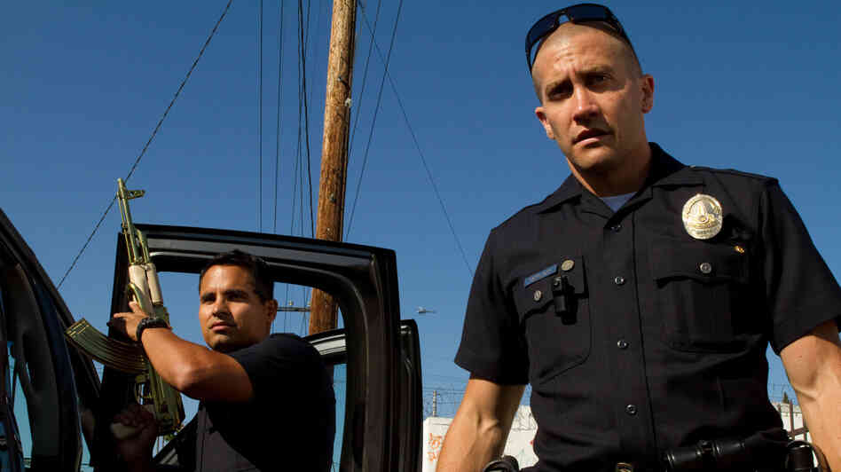 Officers Brian Taylor (Jake Gyllenhaal) and Mike Zavala (Michael Peña) become the targets of a drug cartel in End of Watch. Officers Brian Taylor (Jake Gyllenhaal) and Mike Zavala (Michael Peña) become the targets of a drug cartel in End of Watch.
